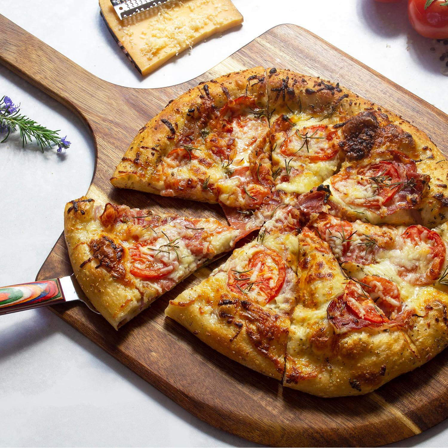 Wooden charcuterie and pizza serving board